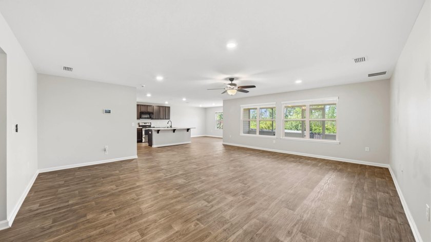 Welcome to a beautifully maintained 4-bedroom, 2-bath home in - photo 3