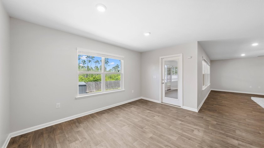 Welcome to a beautifully maintained 4-bedroom, 2-bath home in - photo 6