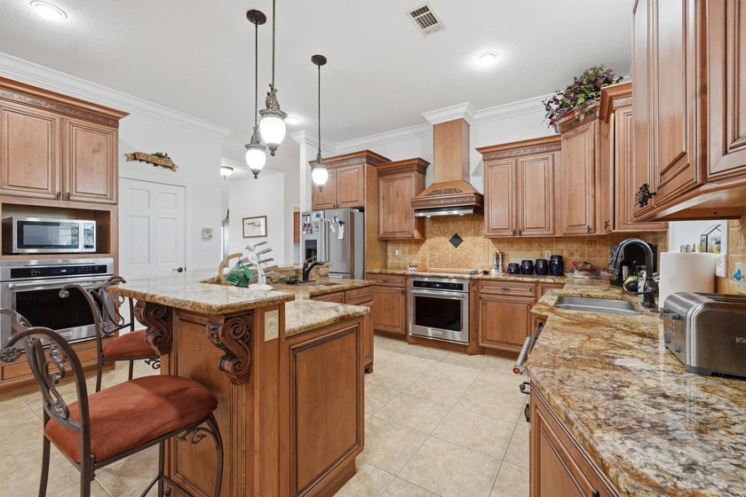 Beyond a private gated entrance, discover an elegant - photo 14