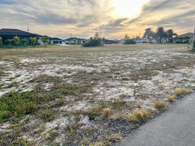 This cleared lot is located amongst large, newer homes - photo 2
