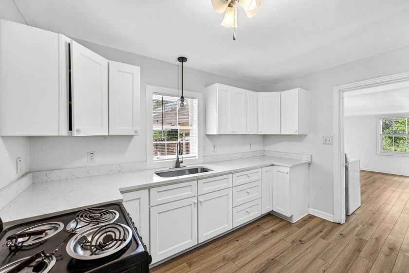 Updated &amp; Move-In Ready! This remodeled 3-bedroom, 1.5-bath home - photo 8