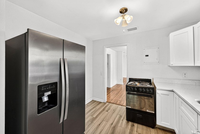Updated &amp; Move-In Ready! This remodeled 3-bedroom, 1.5-bath home - photo 10