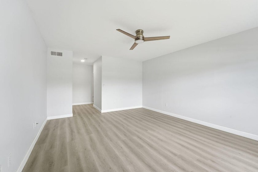 FULLY RENOVATED, 1st-FLOOR, LAKE FRONT condo located in the - photo 11