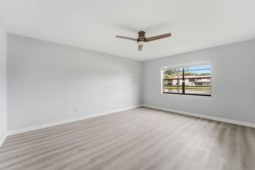 FULLY RENOVATED, 1st-FLOOR, LAKE FRONT condo located in the - photo 12