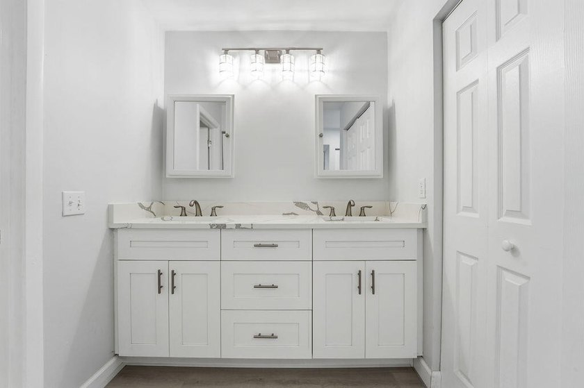 FULLY RENOVATED, 1st-FLOOR, LAKE FRONT condo located in the - photo 13