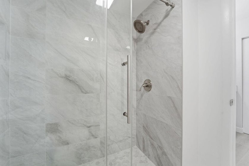 FULLY RENOVATED, 1st-FLOOR, LAKE FRONT condo located in the - photo 15