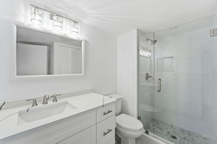 FULLY RENOVATED, 1st-FLOOR, LAKE FRONT condo located in the - photo 18