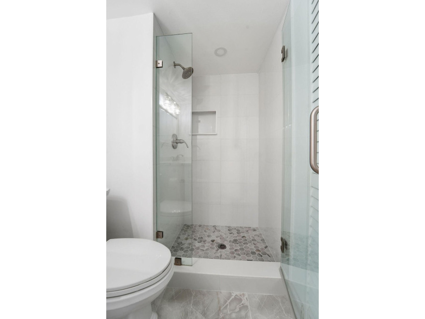 FULLY RENOVATED, 1st-FLOOR, LAKE FRONT condo located in the - photo 19