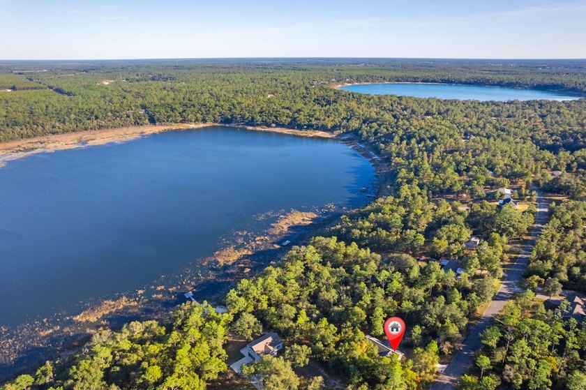 Welcome to your lakefront retreat! This 3BR/2BA home sits on a - photo 46