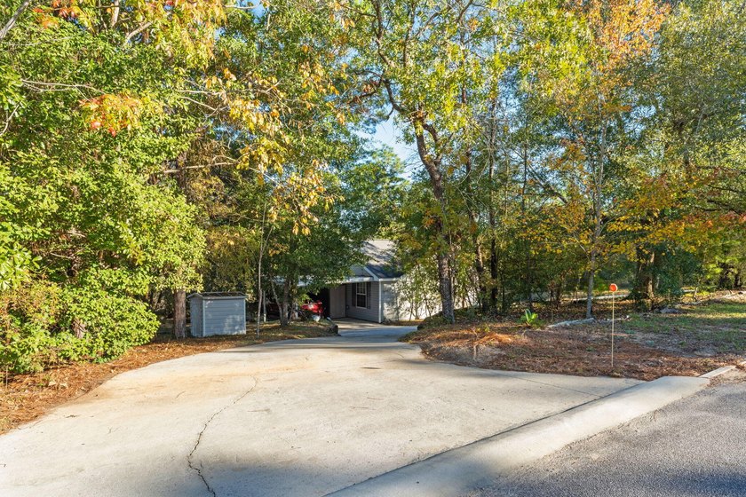 Welcome to your lakefront retreat! This 3BR/2BA home sits on a - photo 49