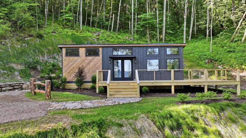 Perched on 1.12 private acres, this custom-built Timbercraft - photo 3