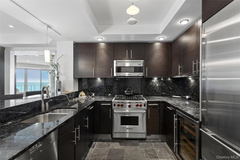 Experience unparalleled coastal living in this exceptional - photo 28