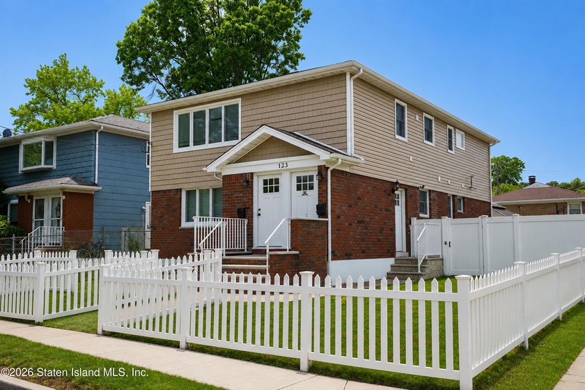 Welcome to 123 Hooper Avenue - a beautifully maintained detached - photo 4