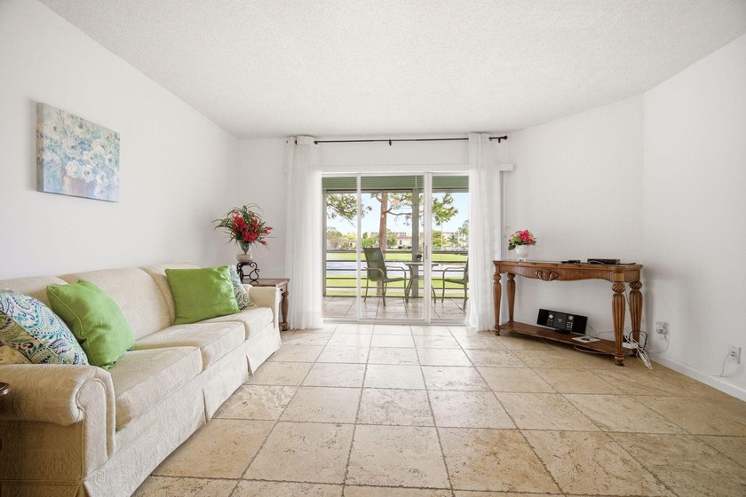 Beautifully maintained 2nd-floor 1-bedroom, 1.5-bath condo with - photo 7