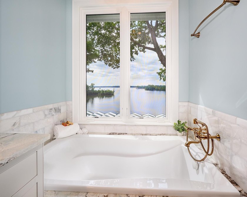 Experience Lake Minnetonka luxury in this like-new end-unit - photo 31