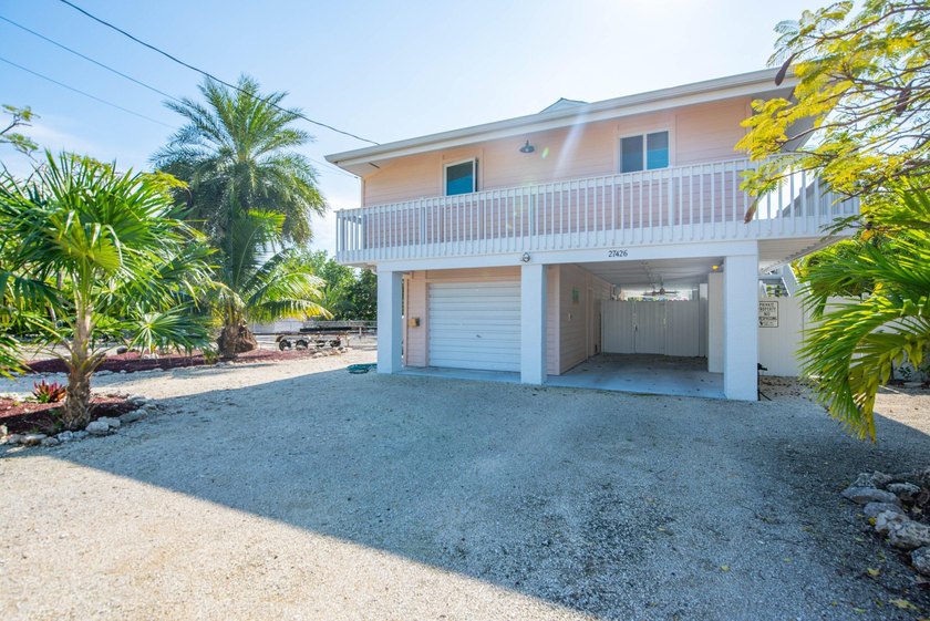 Oceanside canal-front home in the desirable Breezeswept Beach - photo 32