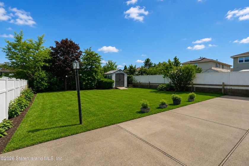 Welcome to 666 Armstrong Avenue, a well-maintained two-family in - photo 4