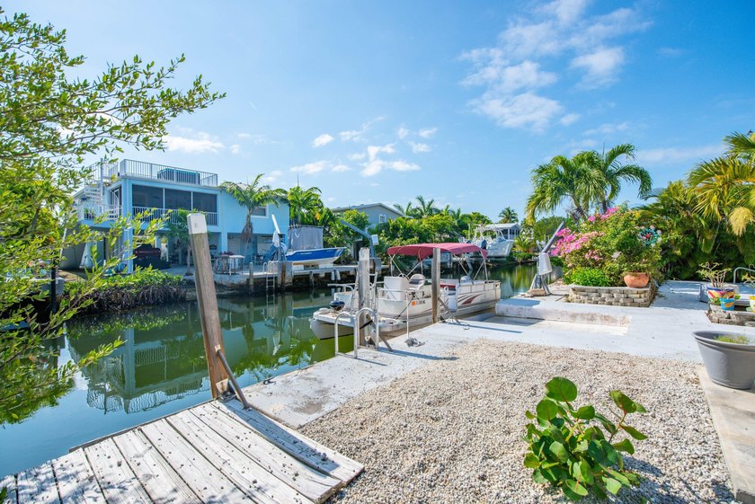 Oceanside canal-front home in the desirable Breezeswept Beach - photo 35