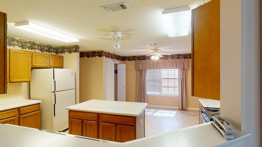 This 3-bedroom, 2-bath home with an attached 1-car garage is - photo 5