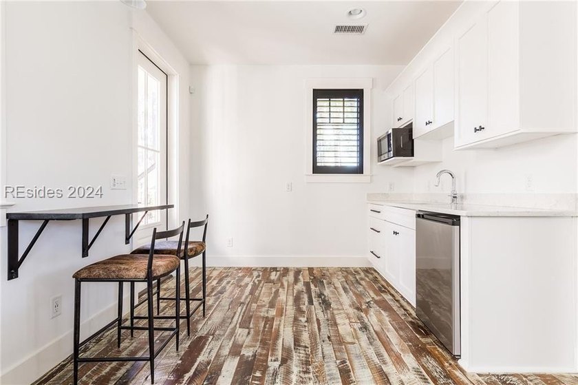 Delight in the welcoming luxury of this four-bedroom - photo 23