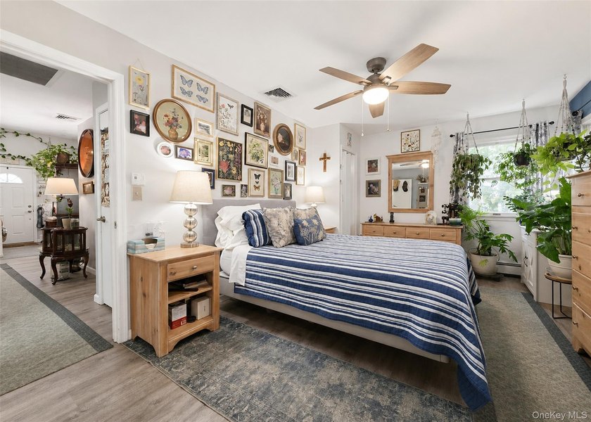 Spacious and open floor plan with cathedral ceilings welcome you - photo 9