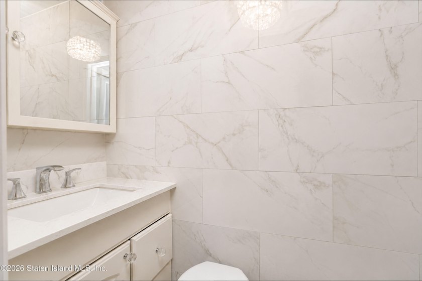 Welcome to this beautifully maintained semi-attached home in the - photo 8