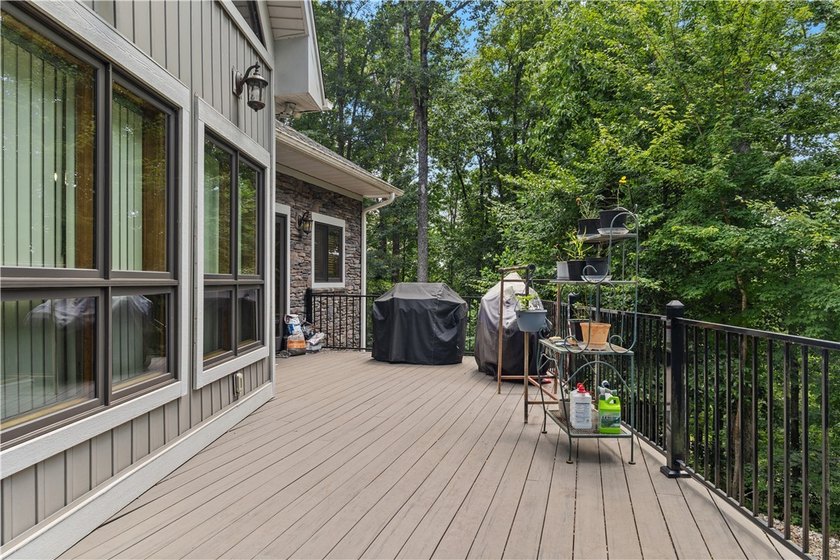 Experience exceptional lakefront living in this custom-built - photo 9