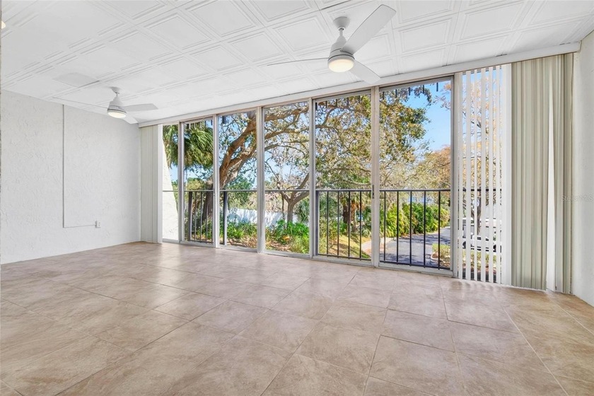Welcome to easy first-floor living in this bright corner unit - photo 13