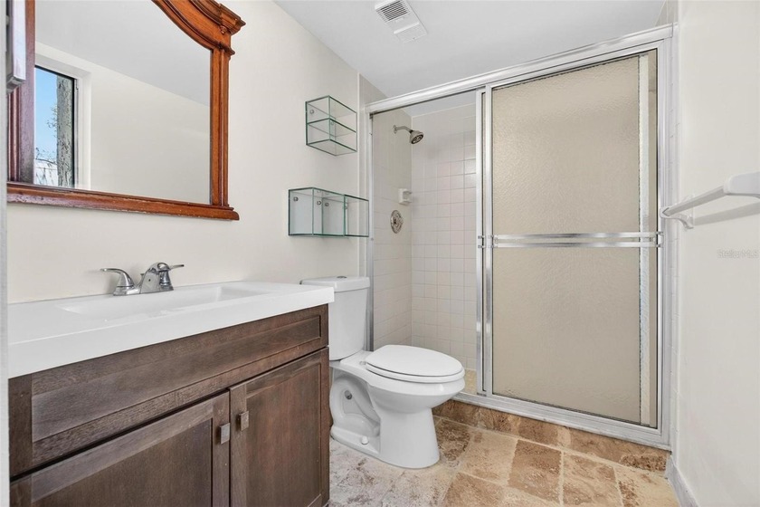 Welcome to easy first-floor living in this bright corner unit - photo 16
