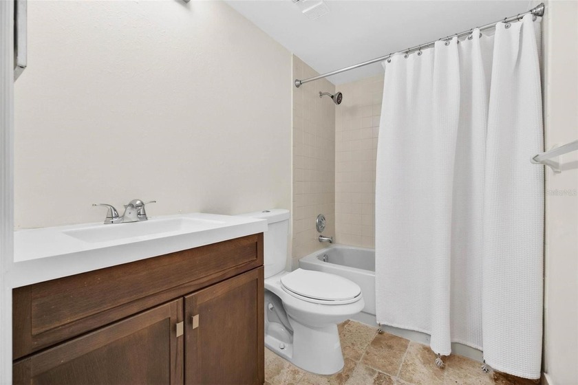 Welcome to easy first-floor living in this bright corner unit - photo 19