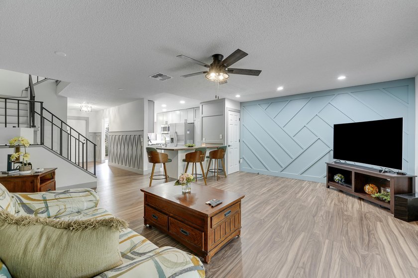 This stunning two-story residence has been completely remodeled - photo 12