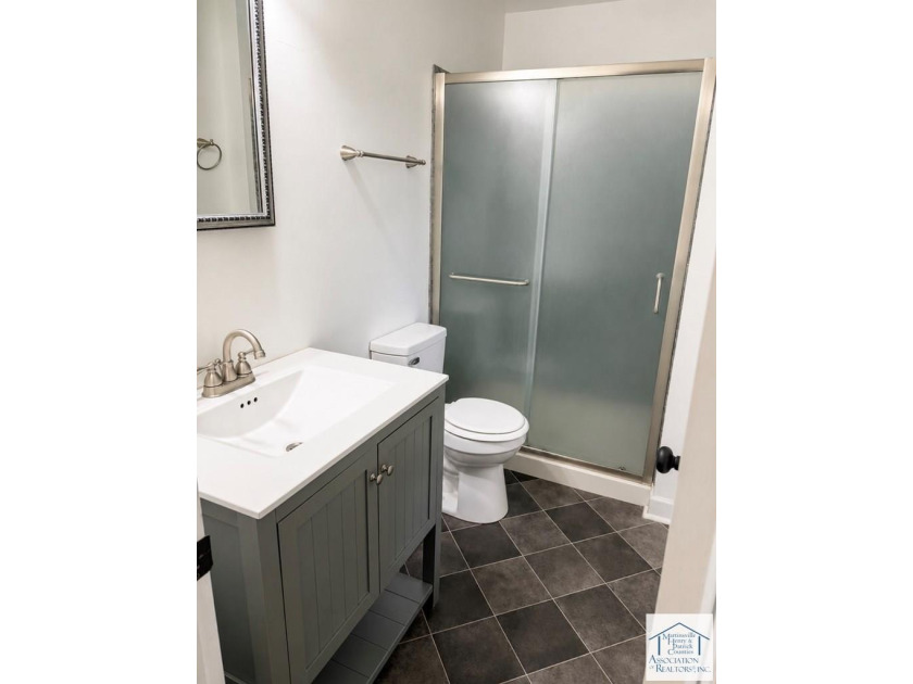 Welcome to this charming 3-bedroom, 2-full-bath brick ranch in - photo 16