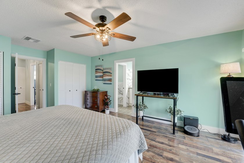 This stunning two-story residence has been completely remodeled - photo 18