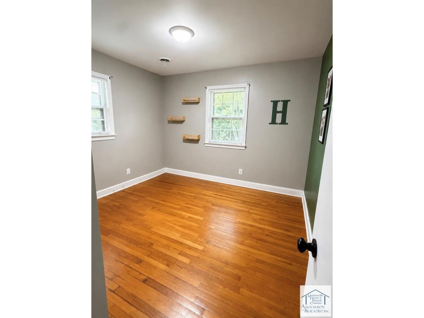 Welcome to this charming 3-bedroom, 2-full-bath brick ranch in - photo 19