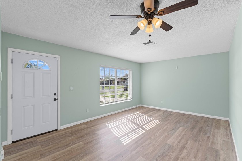 Charming 2-bedroom, 2-bath home situated on a spacious 10,000 sq - photo 3