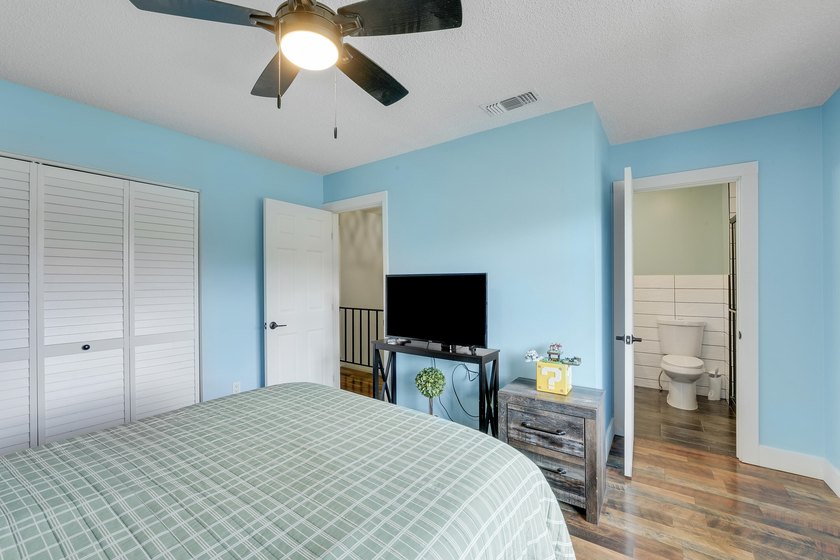 This stunning two-story residence has been completely remodeled - photo 23