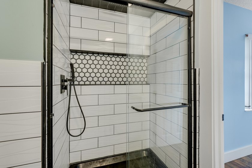 This stunning two-story residence has been completely remodeled - photo 25