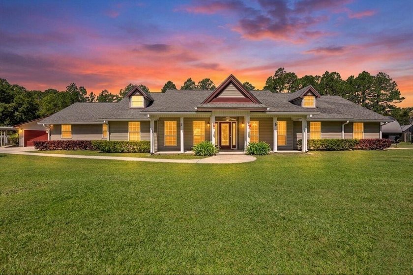 Welcome to a comfortable country retreat tucked into the highly - photo 3