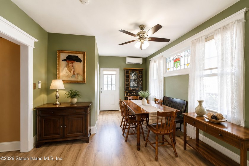 Welcome to 73 Walnut Street! Step into the inviting sunroom, a - photo 8