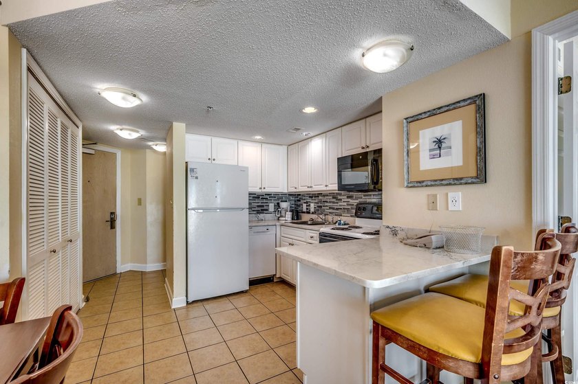 Grab your piece of PARADISE with this 2 bedroom/ 2 bath ocean - photo 4