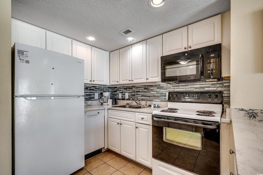 Grab your piece of PARADISE with this 2 bedroom/ 2 bath ocean - photo 6