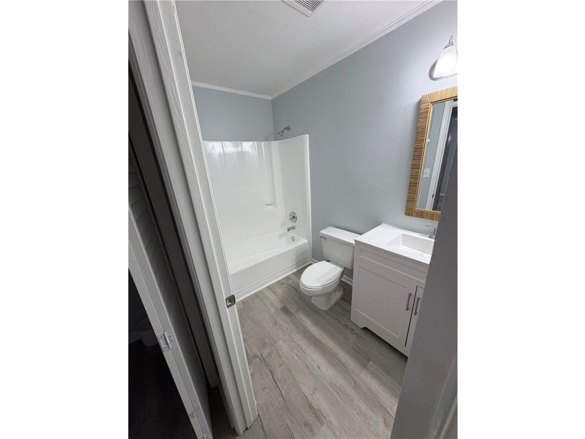 Discover a beautifully remodeled condominium offering a tranquil - photo 9