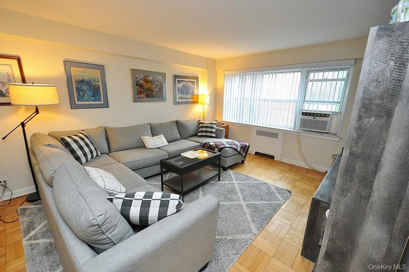 Welcome home to this sun-drenched and beautifully spacious - photo 6