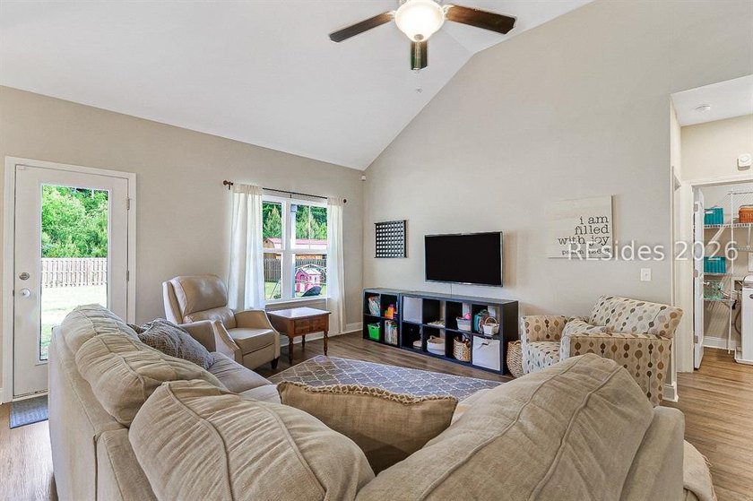 Enjoy this single level, 3BR/2BA open floor plan home on almost - photo 8
