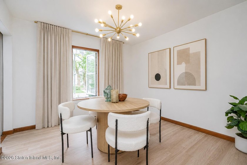 This charming fully detached Cape-style home offers a rare - photo 4