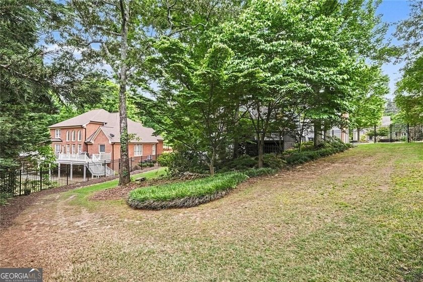 Seller to pay $5,000 toward Closing Cost. TRADITIONAL BRICK HOME - photo 49