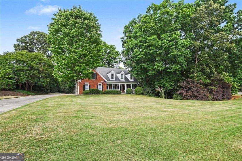 Seller to pay $5,000 toward Closing Cost. TRADITIONAL BRICK HOME - photo 50
