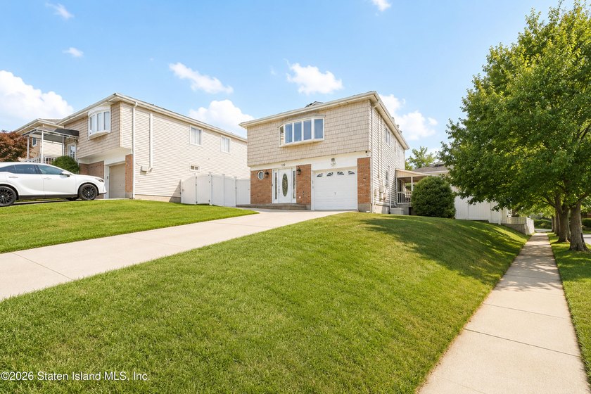 Welcome to this beautifully updated raised ranch in the heart of - photo 4