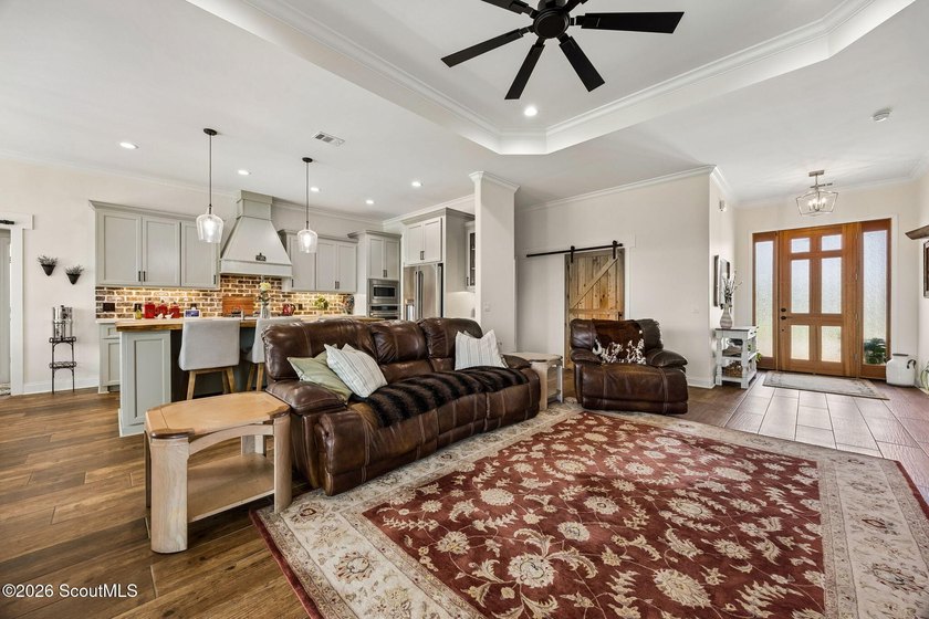 SHOWING LIKE A MODEL HOME, this exceptional custom-built - photo 13