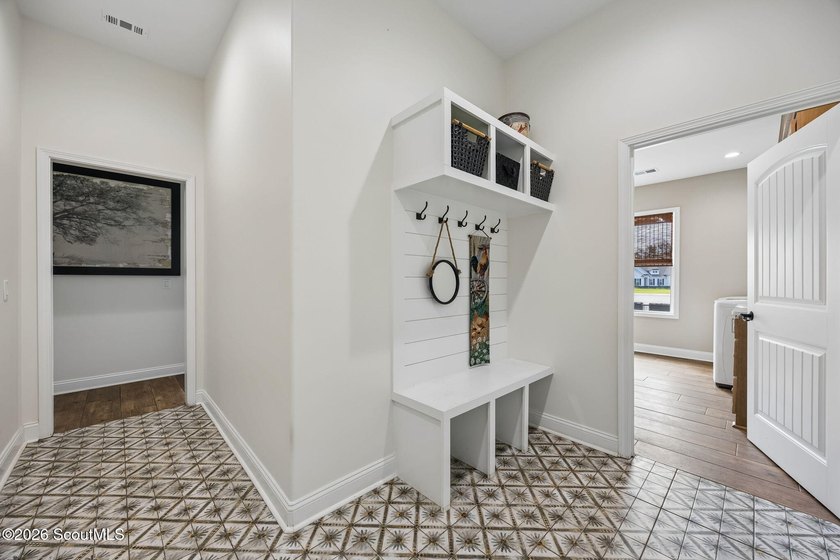 SHOWING LIKE A MODEL HOME, this exceptional custom-built - photo 38